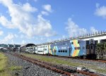 Northbound Tri-Rail Train # P668 leaves the Miami Airport Station behind in the very beginning of its journey to Magonia Park 